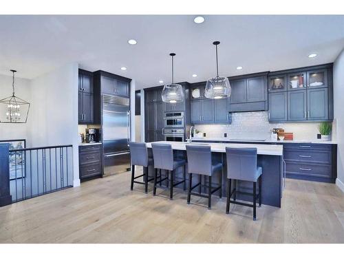 107 Crestridge Hill Sw, Calgary, AB - Indoor Photo Showing Kitchen With Upgraded Kitchen