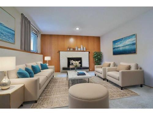 8 Varshaven Place Nw, Calgary, AB - Indoor Photo Showing Living Room With Fireplace