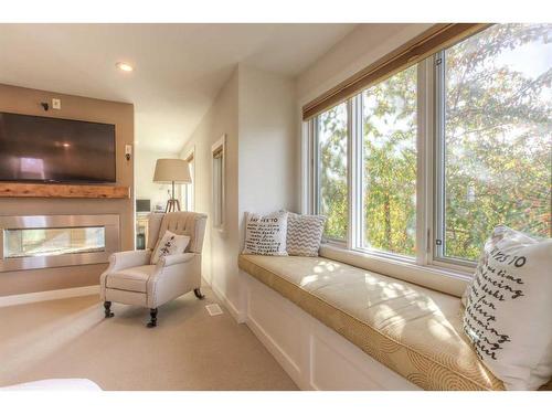 27 Cornwallis Drive Nw, Calgary, AB - Indoor Photo Showing Living Room With Fireplace