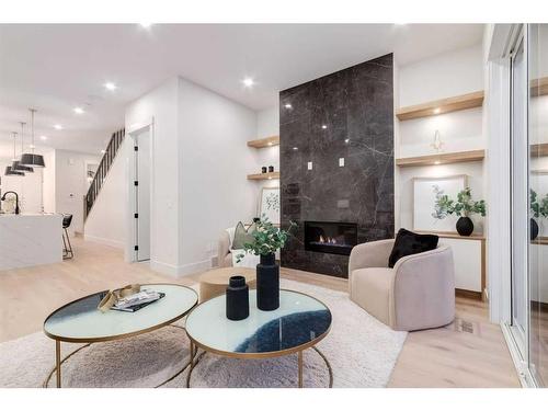 2416 35 Street Sw, Calgary, AB - Indoor Photo Showing Living Room With Fireplace