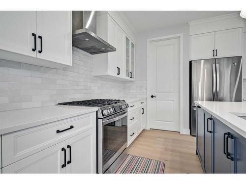 77 Belmont Villas Sw, Calgary, AB - Indoor Photo Showing Kitchen With Stainless Steel Kitchen With Upgraded Kitchen