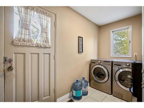 244 Cannington Place Sw, Calgary, AB - Indoor Photo Showing Laundry Room