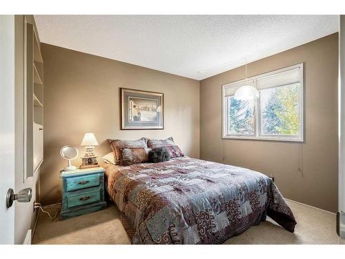 244 Cannington Place Sw, Calgary, AB - Indoor Photo Showing Bedroom