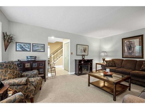 244 Cannington Place Sw, Calgary, AB - Indoor Photo Showing Living Room