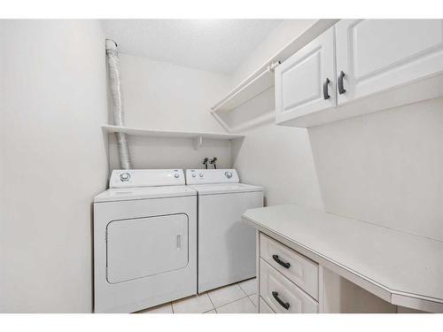 103-225 25 Avenue Sw, Calgary, AB - Indoor Photo Showing Laundry Room