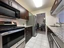 103-225 25 Avenue Sw, Calgary, AB  - Indoor Photo Showing Kitchen With Upgraded Kitchen 