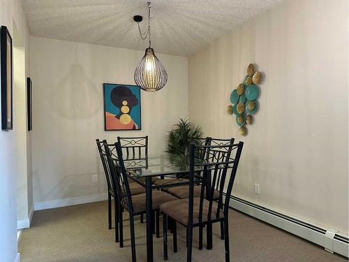 103-225 25 Avenue Sw, Calgary, AB - Indoor Photo Showing Dining Room