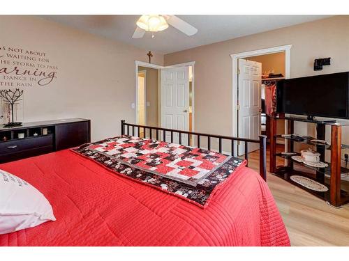 8-12 Silver Creek Boulevard Nw, Airdrie, AB - Indoor Photo Showing Bedroom