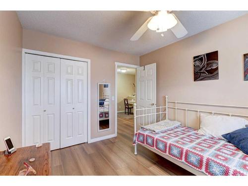 8-12 Silver Creek Boulevard Nw, Airdrie, AB - Indoor Photo Showing Bedroom