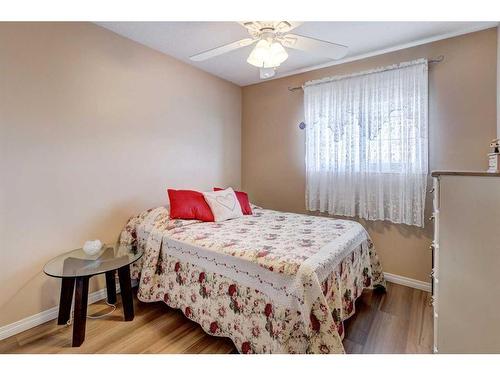 8-12 Silver Creek Boulevard Nw, Airdrie, AB - Indoor Photo Showing Bedroom