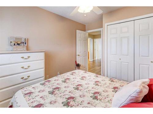 8-12 Silver Creek Boulevard Nw, Airdrie, AB - Indoor Photo Showing Bedroom