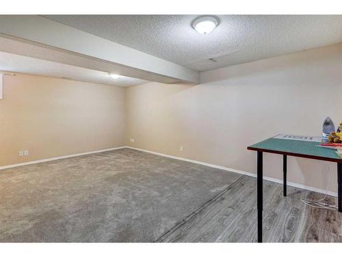 8-12 Silver Creek Boulevard Nw, Airdrie, AB - Indoor Photo Showing Other Room