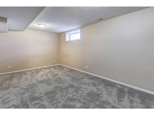 8-12 Silver Creek Boulevard Nw, Airdrie, AB - Indoor Photo Showing Other Room