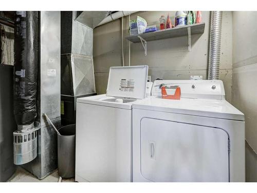 8-12 Silver Creek Boulevard Nw, Airdrie, AB - Indoor Photo Showing Laundry Room