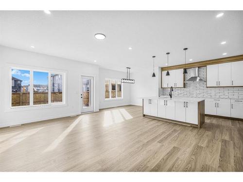 853 Midtown Drive Sw, Airdrie, AB - Indoor Photo Showing Kitchen With Upgraded Kitchen