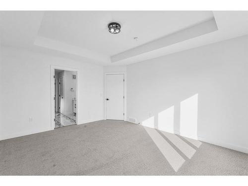 853 Midtown Drive Sw, Airdrie, AB - Indoor Photo Showing Other Room