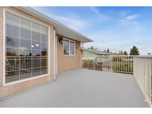 1239 Hunterquay Hill Nw, Calgary, AB - Outdoor With Deck Patio Veranda With Exterior