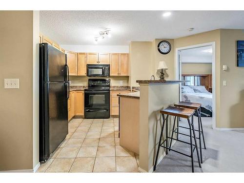 2313-2518 Fish Creek Boulevard Sw, Calgary, AB - Indoor Photo Showing Kitchen