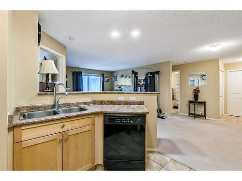 2313-2518 Fish Creek Boulevard Sw, Calgary, AB - Indoor Photo Showing Kitchen With Double Sink