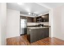 319-955 Mcpherson Road Ne, Calgary, AB  - Indoor Photo Showing Kitchen With Double Sink 