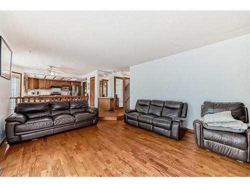 66 Woodpark Circle Sw, Calgary, AB - Indoor Photo Showing Living Room