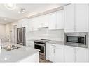 114-138 Sage Valley Common Nw, Calgary, AB  - Indoor Photo Showing Kitchen With Double Sink With Upgraded Kitchen 