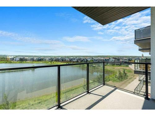 2306-42 Cranbrook Gardens Se, Calgary, AB - Outdoor With Body Of Water With Balcony With View