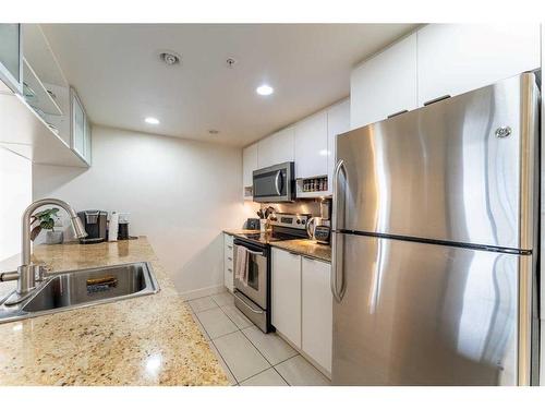 802-1110 11 Street Sw, Calgary, AB - Indoor Photo Showing Kitchen With Stainless Steel Kitchen