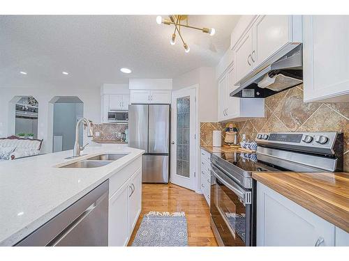 155 Cranwell Green Se, Calgary, AB - Indoor Photo Showing Kitchen With Double Sink