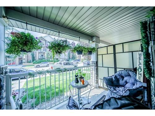 111-2000 Applevillage Court Se, Calgary, AB - Outdoor With Deck Patio Veranda With Exterior