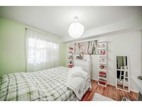 111-2000 Applevillage Court Se, Calgary, AB - Indoor Photo Showing Bedroom