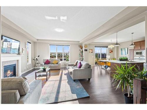 121 Cityscape Gardens Ne, Calgary, AB - Indoor Photo Showing Living Room With Fireplace