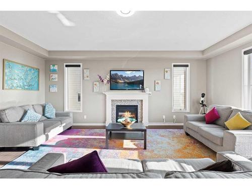 121 Cityscape Gardens Ne, Calgary, AB - Indoor Photo Showing Living Room With Fireplace