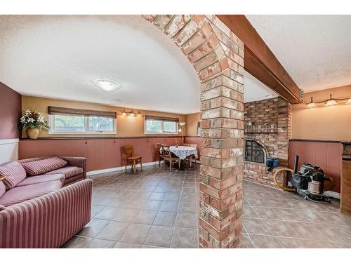 36 Forest Green Se, Calgary, AB - Indoor Photo Showing Other Room With Fireplace