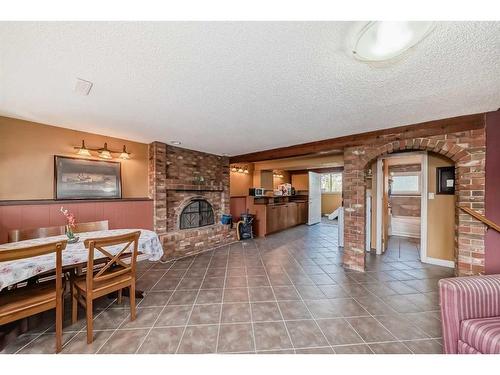 36 Forest Green Se, Calgary, AB - Indoor With Fireplace