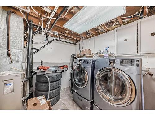 36 Forest Green Se, Calgary, AB - Indoor Photo Showing Laundry Room