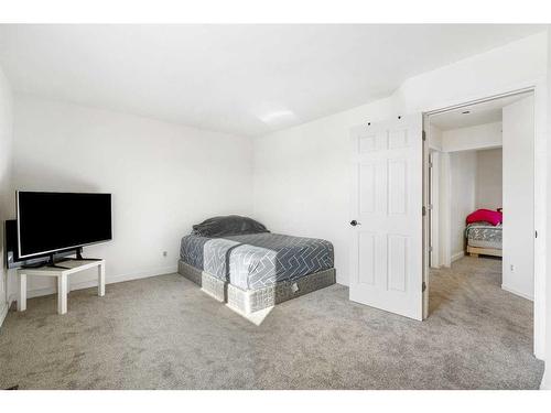 23 Martinwood Way Ne, Calgary, AB - Indoor Photo Showing Bedroom