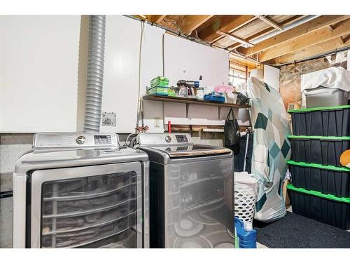 23 Martinwood Way Ne, Calgary, AB - Indoor Photo Showing Laundry Room