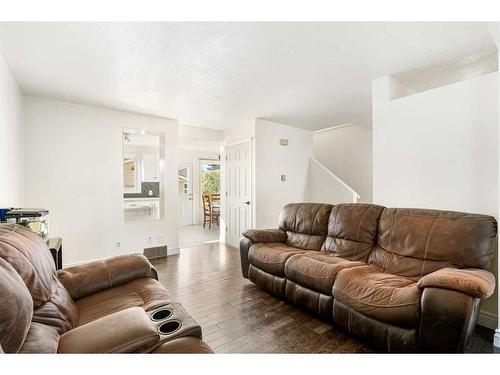 23 Martinwood Way Ne, Calgary, AB - Indoor Photo Showing Living Room