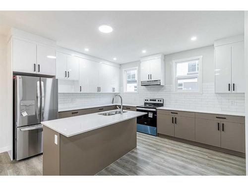 119 Corner Meadows Square Ne, Calgary, AB - Indoor Photo Showing Kitchen With Stainless Steel Kitchen With Double Sink With Upgraded Kitchen