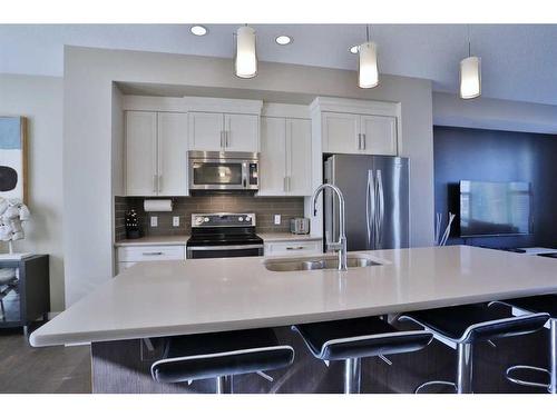 131 New Brighton Walk Se, Calgary, AB - Indoor Photo Showing Kitchen With Stainless Steel Kitchen With Double Sink