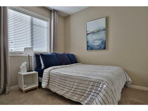 131 New Brighton Walk Se, Calgary, AB - Indoor Photo Showing Bedroom