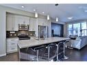 131 New Brighton Walk Se, Calgary, AB  - Indoor Photo Showing Kitchen With Stainless Steel Kitchen With Upgraded Kitchen 