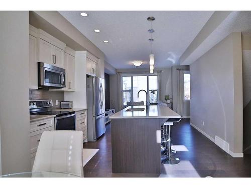 131 New Brighton Walk Se, Calgary, AB - Indoor Photo Showing Kitchen With Stainless Steel Kitchen With Upgraded Kitchen