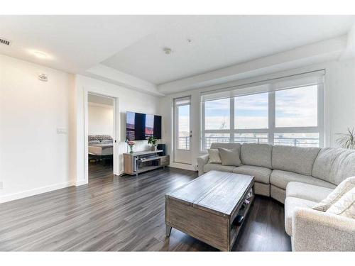 1308-350 Livingston Common Ne, Calgary, AB - Indoor Photo Showing Living Room