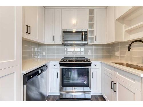 1308-350 Livingston Common Ne, Calgary, AB - Indoor Photo Showing Kitchen With Stainless Steel Kitchen With Upgraded Kitchen