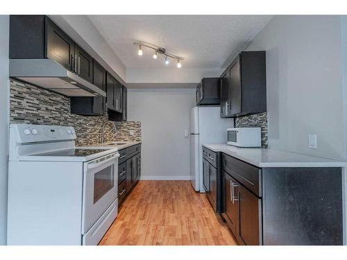 3615 27A Avenue Se, Calgary, AB - Indoor Photo Showing Kitchen