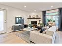 103-1634 29 Avenue Sw, Calgary, AB  - Indoor Photo Showing Living Room With Fireplace 