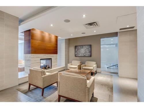 1924-222 Riverfront Avenue Sw, Calgary, AB - Indoor With Fireplace