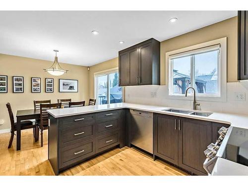 57 Somme Manor Sw, Calgary, AB - Indoor Photo Showing Kitchen With Double Sink